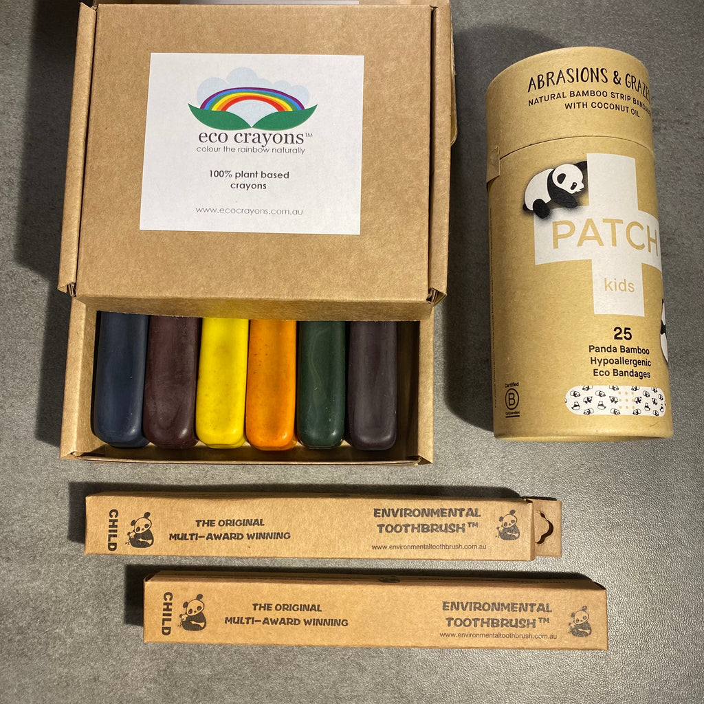 The Happy Boxes Project 'Kids Box' containing eco friendly crayons, bamboo patches bandaids and two bamboo children's toothbrushes from Asiki , Erskineville, Sydney, Australia 