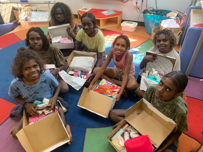 Girls receiving Happy Boxes from the Happy Boxes Project , Sydney, Australia