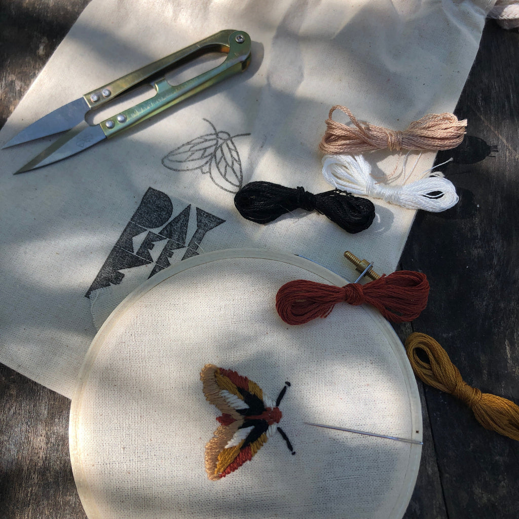 Photo of a Visible Mending Embroidery Kit with a Moth design on it. Available from Asiki, Erskineville, Sydney, Australia.