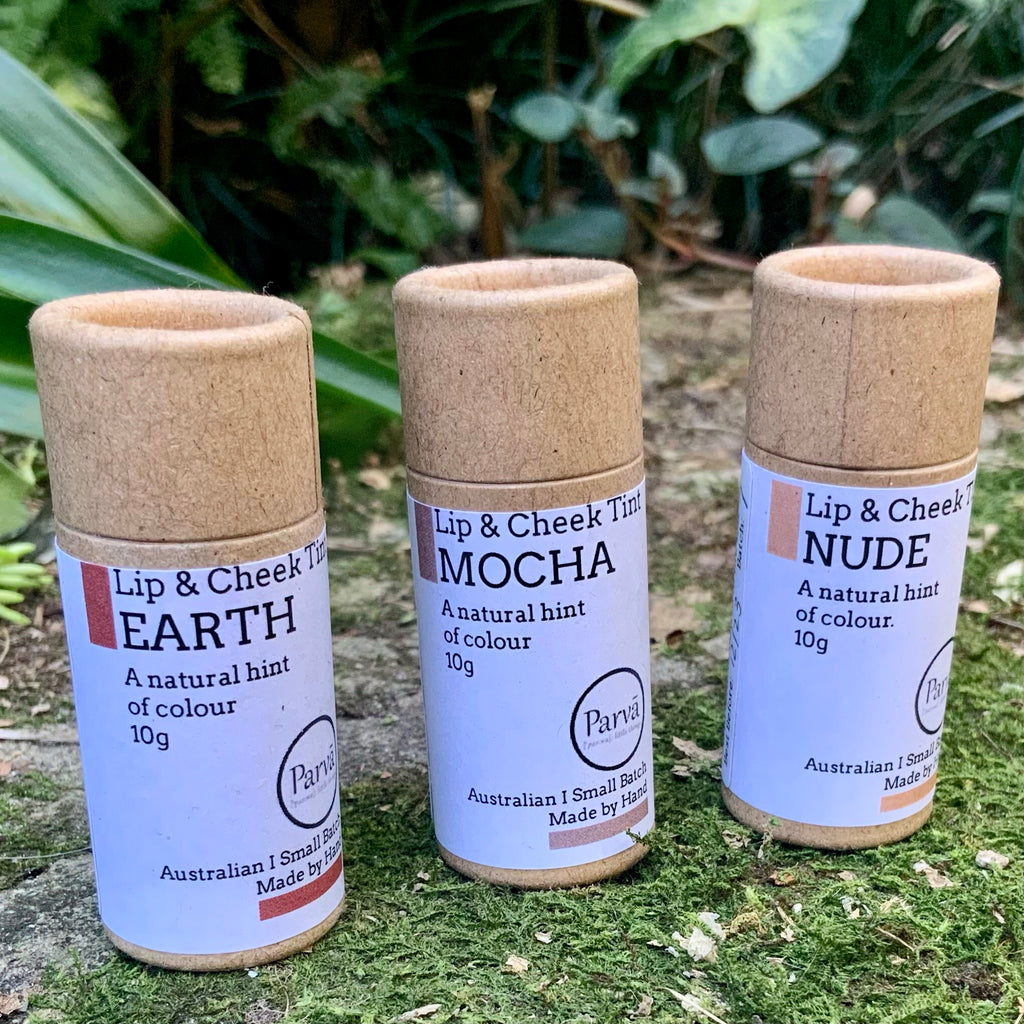 Three cardboard little tubes of Lip & Cheek Balm by Kirsty Mootz of Parva Little Things organic skincare. Available at Asiki.