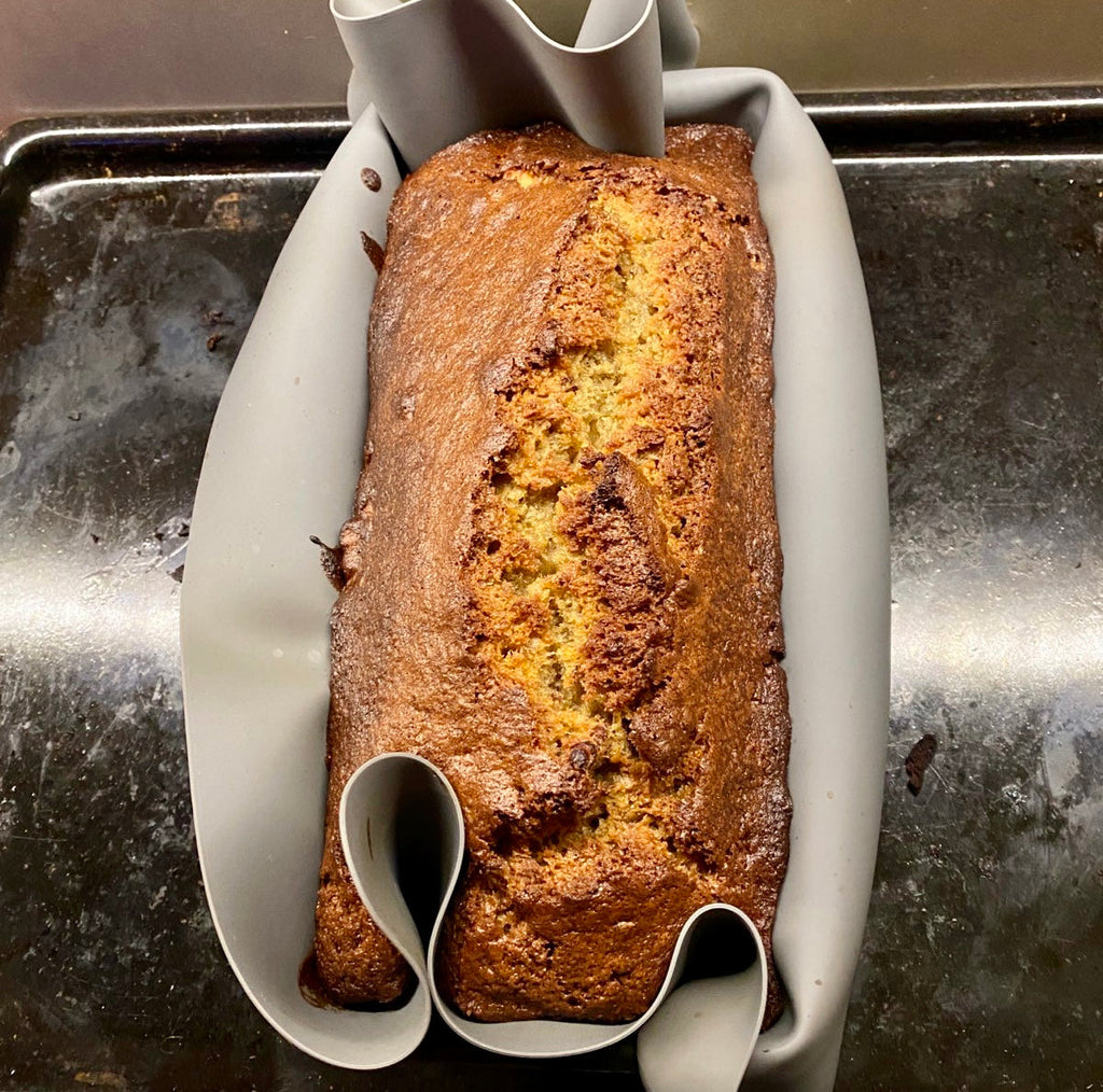Reusable Silicone Baking Sheet Mats in a loaf tin with banana bread from Asiki