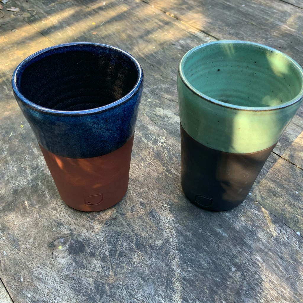 australian made ceramic coffee cups light green glaze on black clay